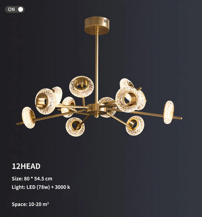 Modern LED chandelier with gold finish. This chandelier features a series of metal rings with crystal shape glass, each embedded with LED lights that cast a radiant sparkle through the glass.