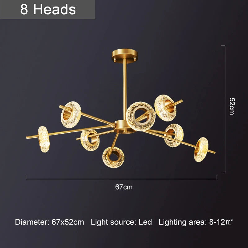 Modern LED chandelier with gold finish. This chandelier features a series of metal rings with crystal shape glass, each embedded with LED lights that cast a radiant sparkle through the glass.